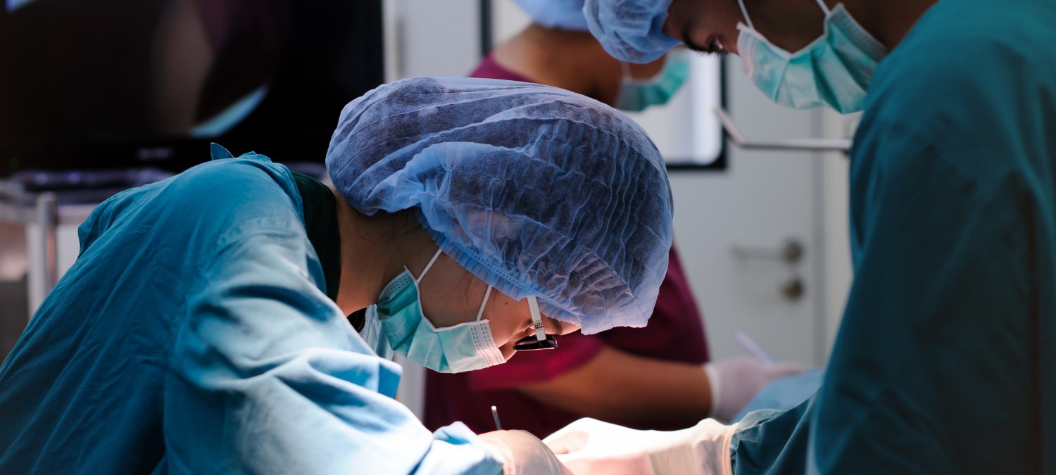 Surgery - Doctors Performing Surgery on Patient Surgery - Doctors Performing Surgery on Patient