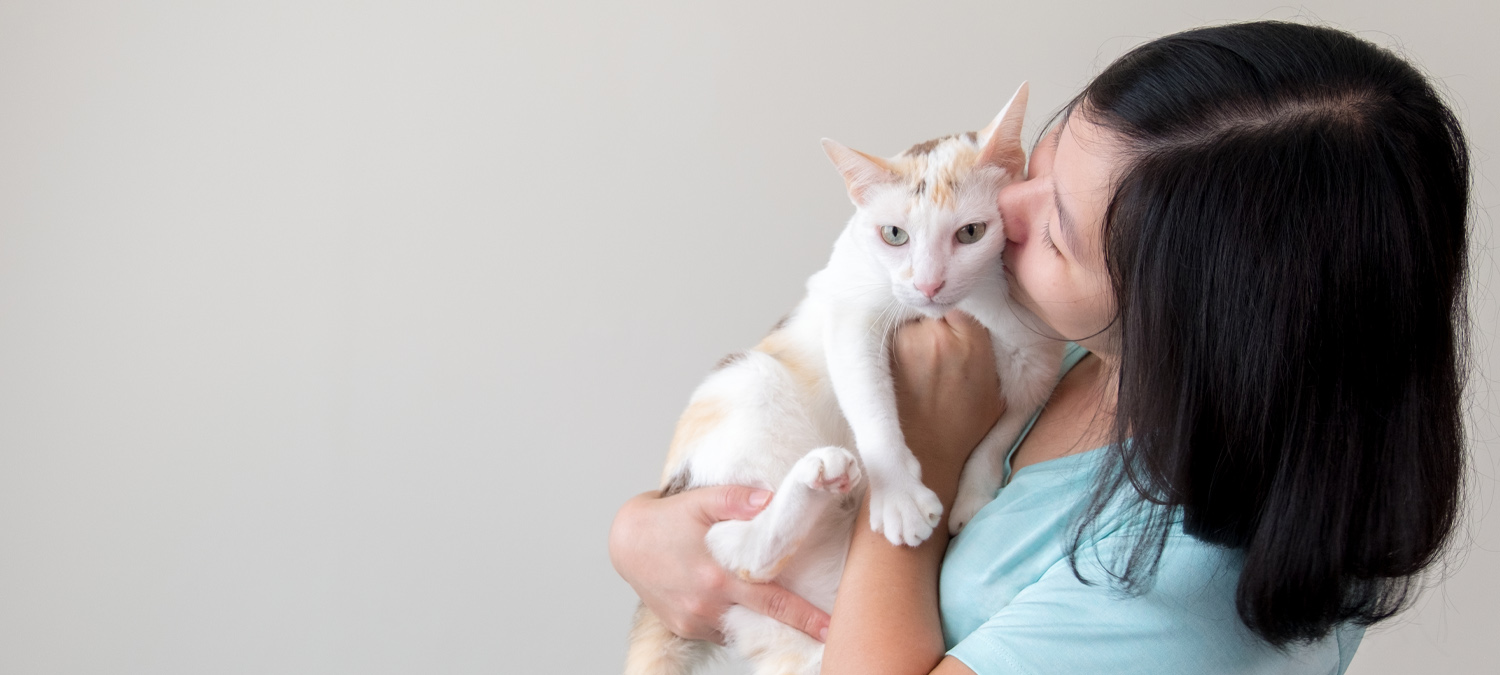 Neurology - Girl Kissing Cats Head